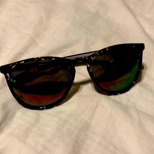 Black and clear framed sunglasses